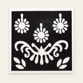 Floral Charm actual stencil design on white backing, displayed against a cleaned ivory background.