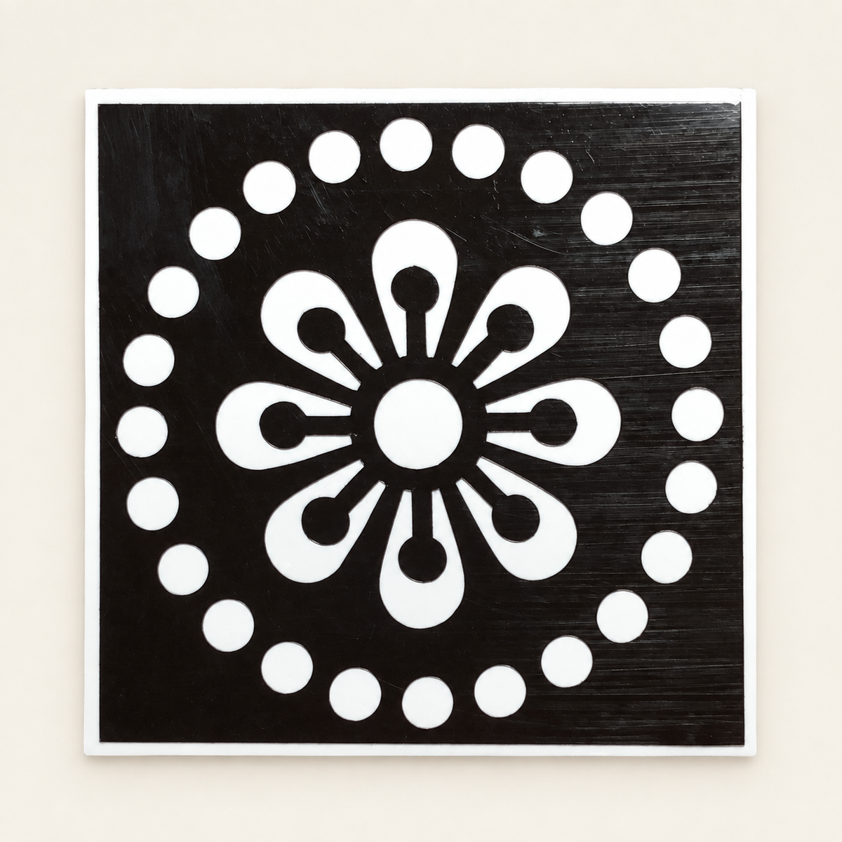 Radiant Petal actual stencil design on white backing, displayed against a cleaned ivory background.